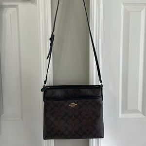 Coach crossbody and matching wrislet